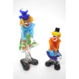 Two brightly coloured Murano style clowns