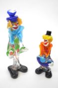 Two brightly coloured Murano style clowns