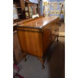 Early 20th Century oak dresser with shelved back over a base with two panelled doors and three