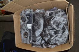 Box of silver coloured curtains