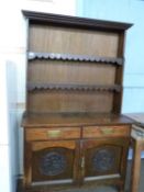 Late 19th/early 20th Century oak dresser with carved decoration