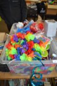 Two boxes of various party accessories