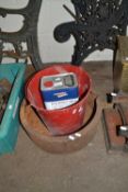 Mixed Lot: Cast iron bowl, red metal bucket and a bottle of spirit wipe