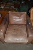 Modern brown leather armchair