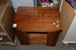 Nest of four hardwood occasional tables
