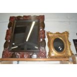 Rectangular wall mirror in a carved floral decorated frame together with a further small gilt framed