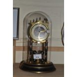 Floral decorated anniversary clock under glass dome