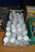 Large quantity of white ceramic coffee cups