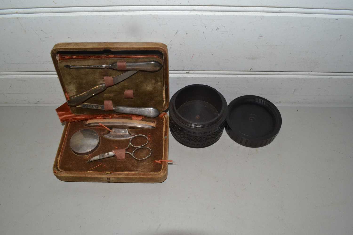 Cased vintage manicure set together with a hardwood dressing table container