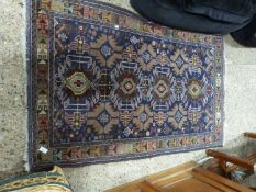 Small Middle Eastern wool floor rug decorated with geometric design on a blue background, 146cm