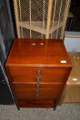 An early 20th Century mahogany music cabinet
