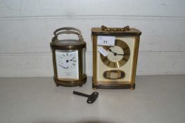 Oval brass cased carriage clock marked Pidduck & Sons, Southport together with a further Quartz