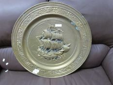 Modern brass wall plaque decorated with a tall ship