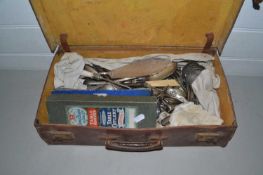 Leather case of various assorted cutlery