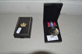 WWII service medal and defence medal, both unnamed