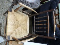 Rush seated spindle back Sussex style Carver chair