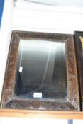 Late 19th Century rectangular bevelled wall mirror in carved frame