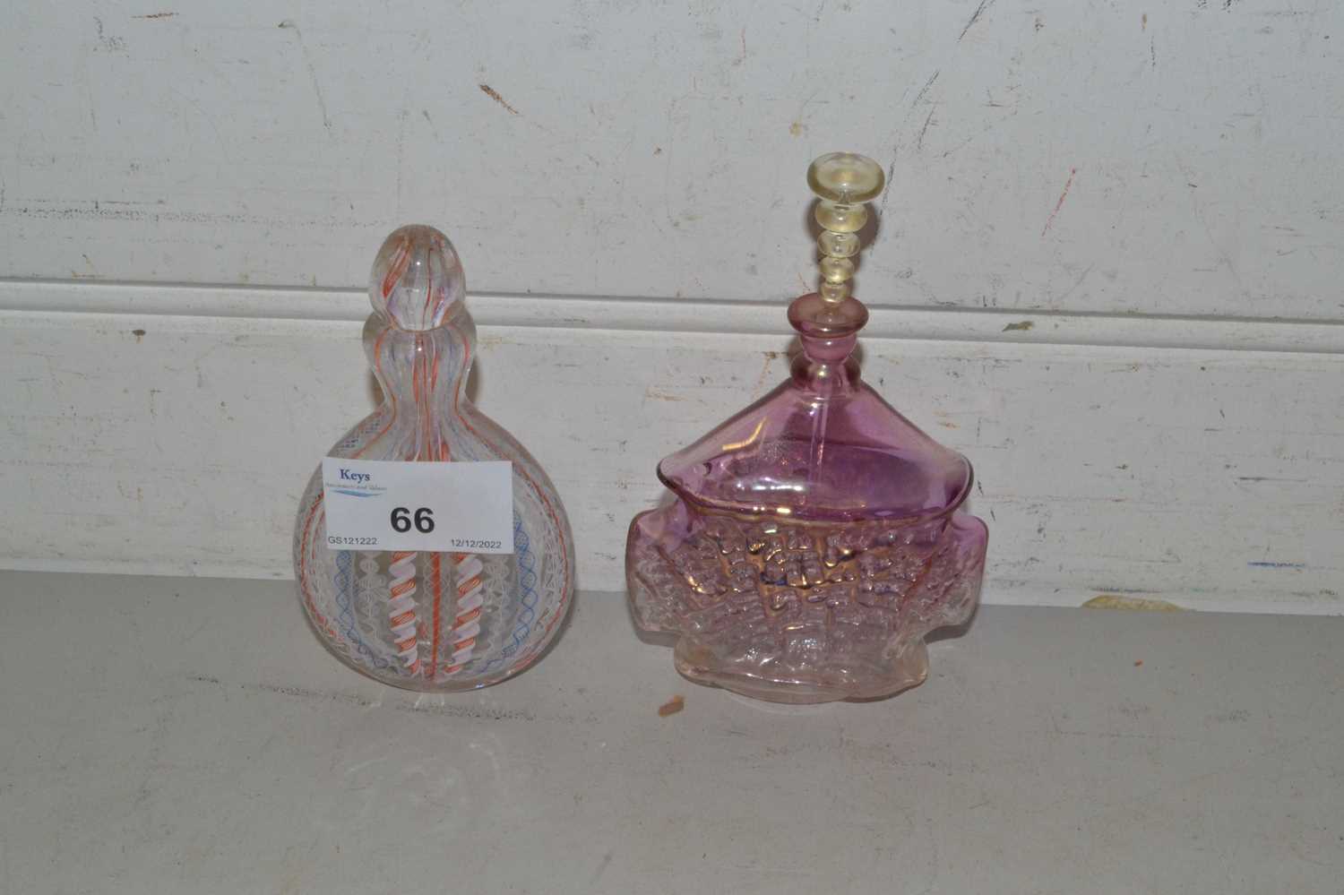 Small glass scent bottle with lattice decoration together with a further bottle (2)