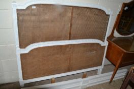 White painted hardwood and cane bed frame, 148cm wide
