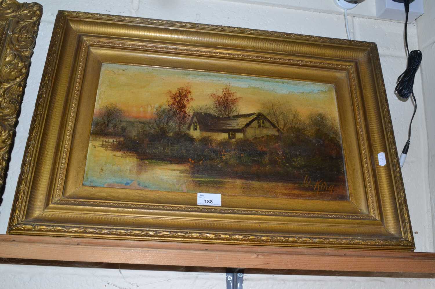 W King, study of a riverside cottage, oil on board, gilt framed