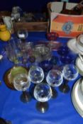 Collection of various assorted coloured drinking glasses, glass bowls and dishes etc