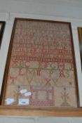 19th Century needlework sampler decorated with rows of text and numbers, signed William and