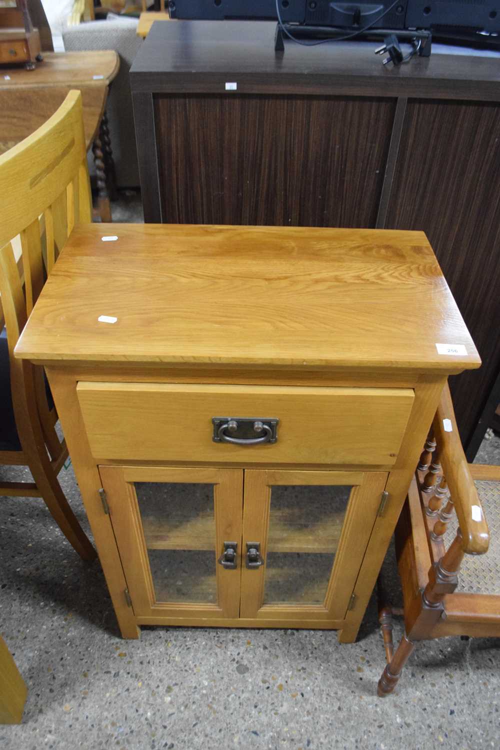 Modern oak side cabinet with glazed doors