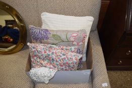 Box of assorted cushions