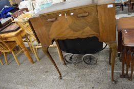 Art Deco style cabriole legged drinks cabinet bearing label to the interior 'hospitality cabinet',