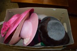 A box of various ladies hats