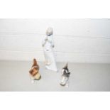 Mixed Lot comprising two pottery dogs and a Lladro style figure (3)