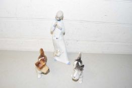 Mixed Lot comprising two pottery dogs and a Lladro style figure (3)