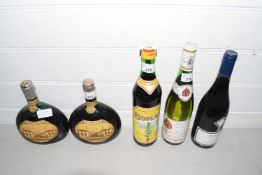 Group of five various bottles to include Meteus