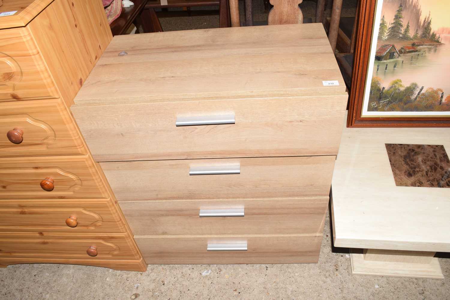 Modern light wood effect four drawer chest