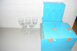 Quantity of clear wine glasses