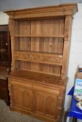 20th Century pine dresser or side cabinet with shelved back with five small drawers over a base