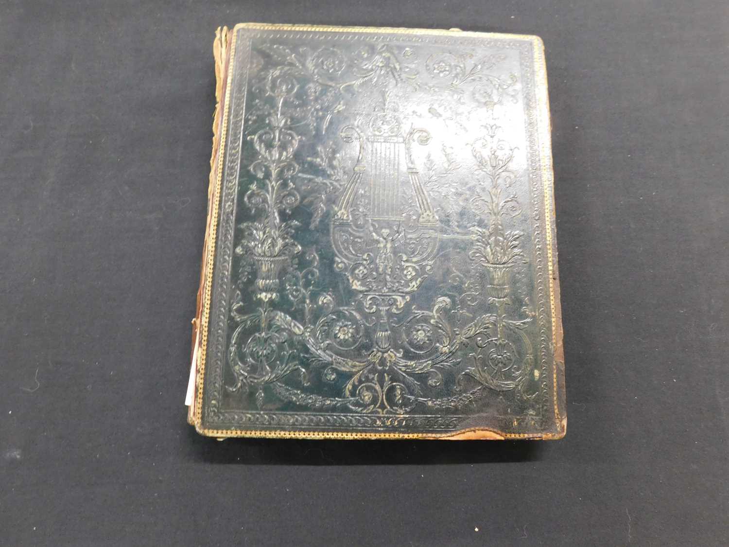 An early Victorian common place album containing assorted mainly pencil and watercolour drawings and