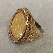 Half sovereign ring in a 9ct gold mount 8.2 g size L
