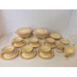 Set of Bristol "Ambertone" yellow and red striped service, two chips to tea cups,