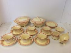Set of Bristol "Ambertone" yellow and red striped service, two chips to tea cups,