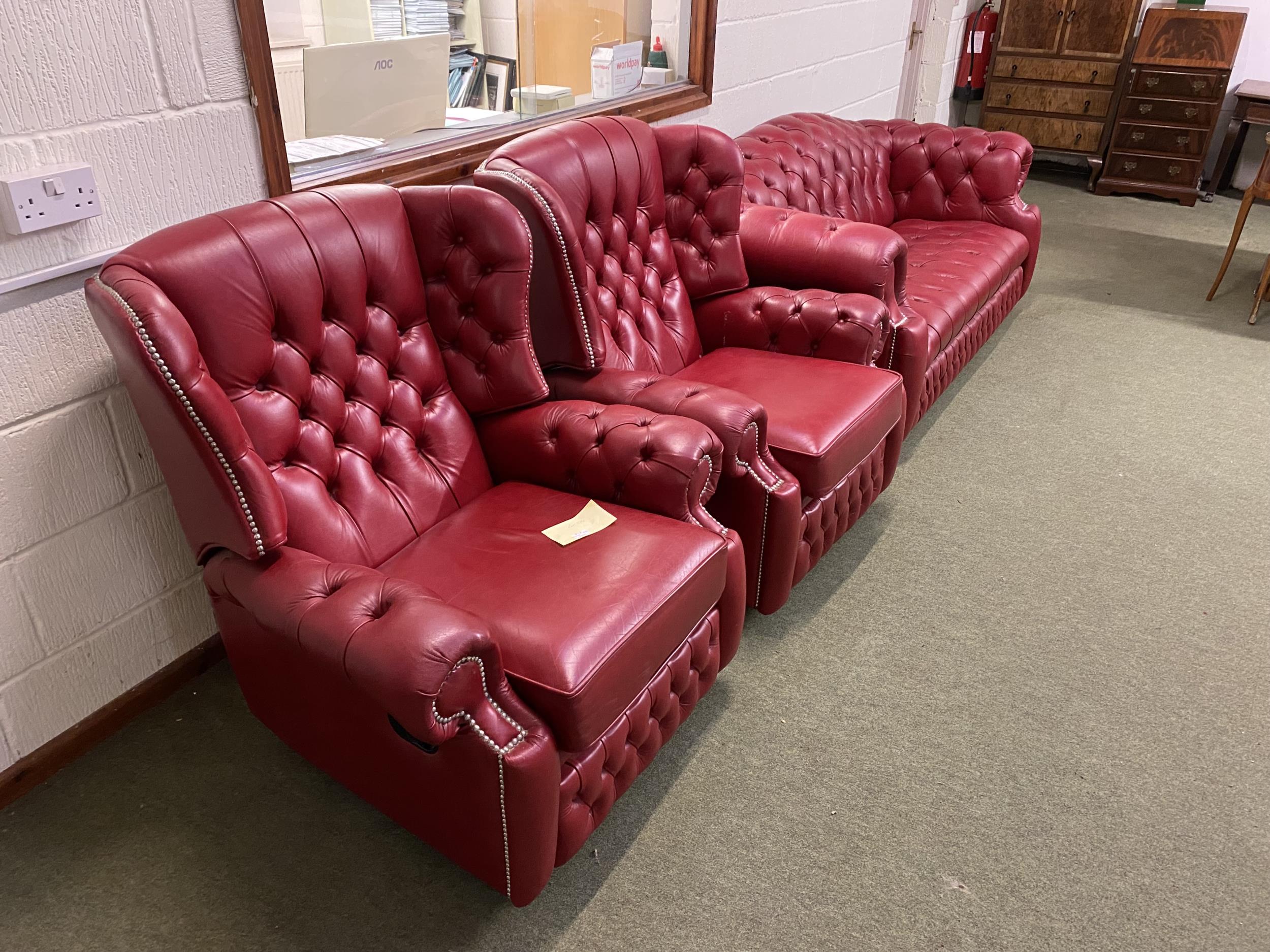 Red leather button back and studd Chesterfield style sofa and pair of reclining chairs (with fire - Image 2 of 3