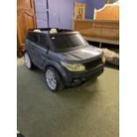 A Child's electric Range Rover Sport, takes 1 driver, 1 passenger.In working order in the Auction