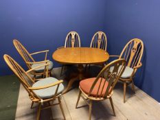 Ercol extending table and 6 Ercol chairs (4 carvers) ( condition - there is a foldaway leaf which