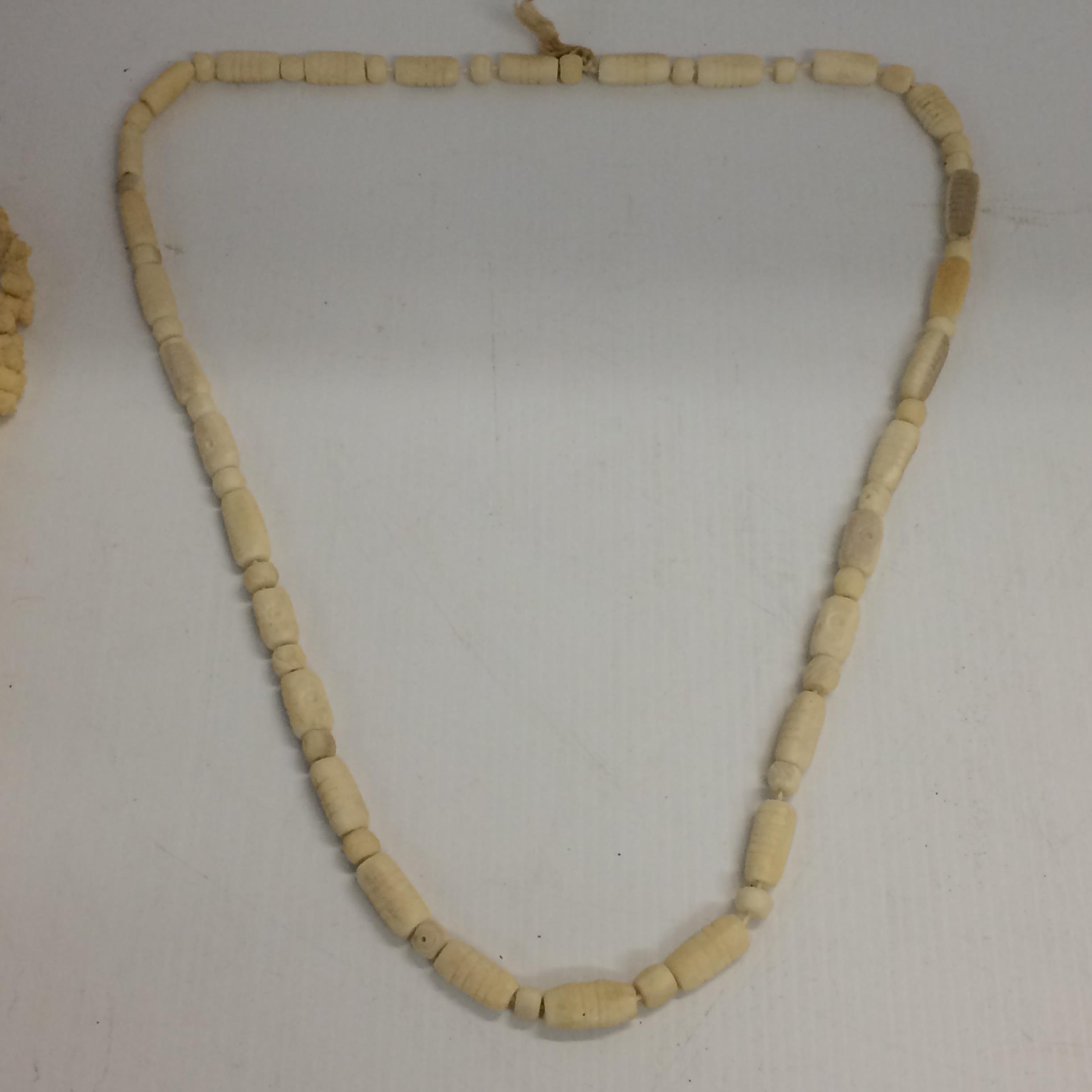 A quantity of bone necklaces and figures - Image 6 of 7