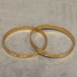 Pair of 9 ct gold bangle bracelets with engine turned decoration 40 g