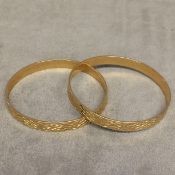 Pair of 9 ct gold bangle bracelets with engine turned decoration 40 g