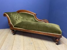 Chaise Longue, upholstered in green fabric, raised on legs and castors, 170cm approx. long x 80cm