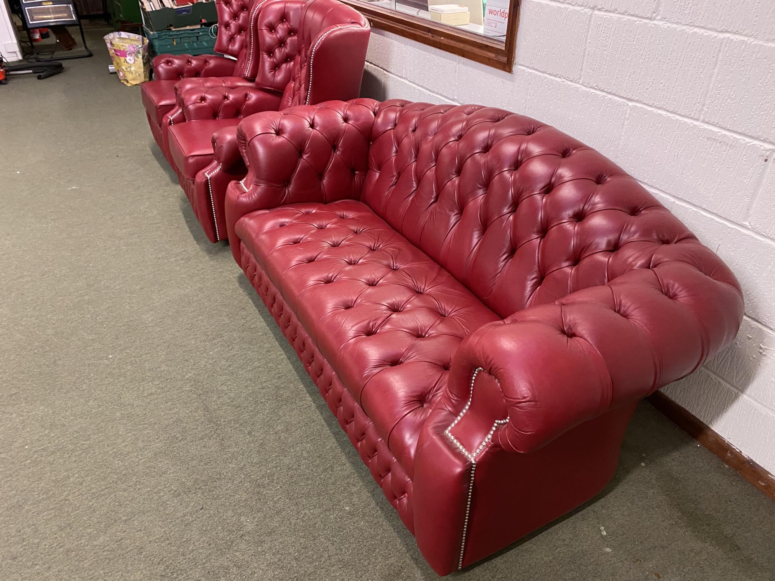 Red leather button back and studd Chesterfield style sofa and pair of reclining chairs (with fire - Image 3 of 3