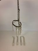 A hanging glass lustre, with 12 hanging pendant drops, each pendant 16cm Long.11.5cm Diameter of