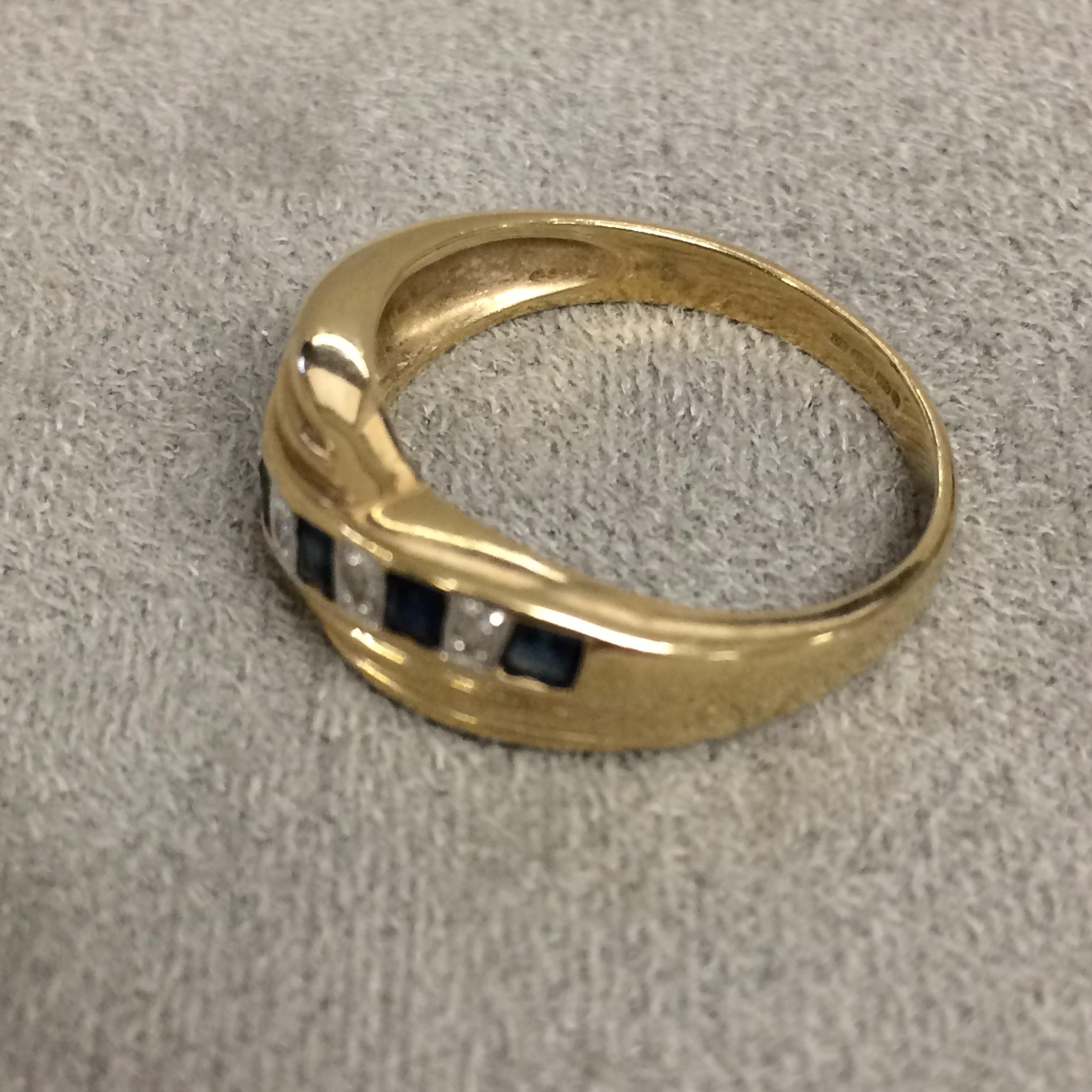 9 ct gold sapphire and diamond ring set with alternating square cut sapphires and single cut - Image 2 of 5